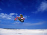 Motocross rider in mid-air.
