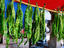 Stink beans hanging up at market.