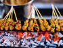 Satay cooking over charcoal, Jalan Alor.