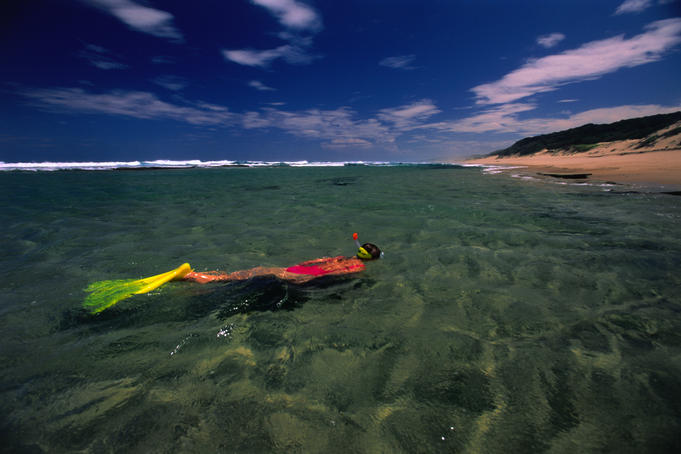 The sandy dunes of LaLa Nek and Mabibi can be seen behind a prime snorkelling spot in Rocktail Bay.
