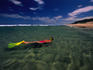 The sandy dunes of LaLa Nek and Mabibi can be seen behind a prime snorkelling spot in Rocktail Bay.