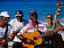 Cuban group playing on beach.