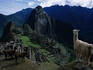 Alpacas above the famous Lost City of the Incas, Machu Picchu with Huayna Picchu beyond.