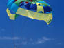 Parasailing over ocean.