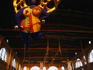 Ravers at the Zurich Streetparade underneath 'The Angel' by Niki de Saint-Phalle in the main train station.