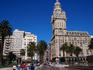 City buildings and palm trees.