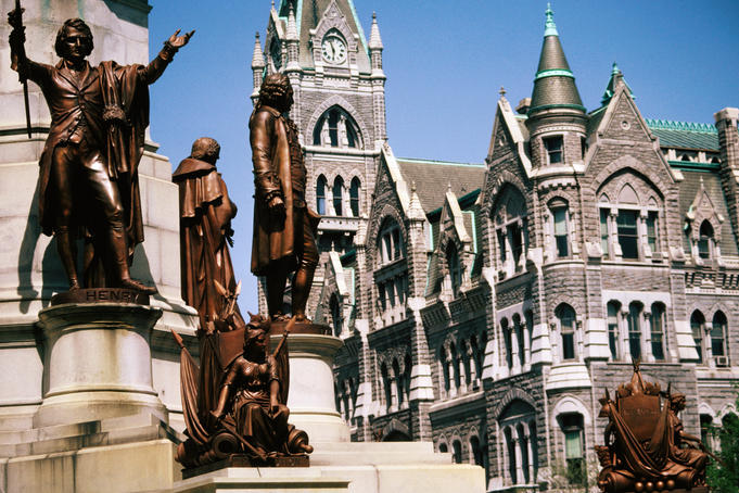Statues outside historic building.
