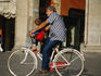 Cycling the Piazza Maggiore in Bologna.