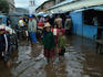 Townsfolk in floodwaters of Lake Titicaca.