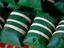 Overhead of balls of steamed rice wrapped in banana leaves, Talaat Sao market.