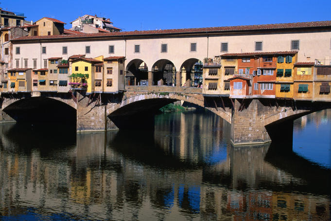 Shops and houses hang off the 14th century Ponte Vecchio.