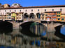 Shops and houses hang off the 14th century Ponte Vecchio.