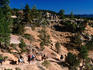 Horseback riders in canyon.