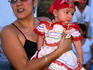 Little girl dressed for a procession in honour of the Virgin of Guadalupe, Suchitoto.
