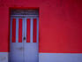 Brightly painted house facade in Suchitoto.