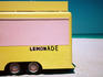 Hand painted lemonade truck on beach.