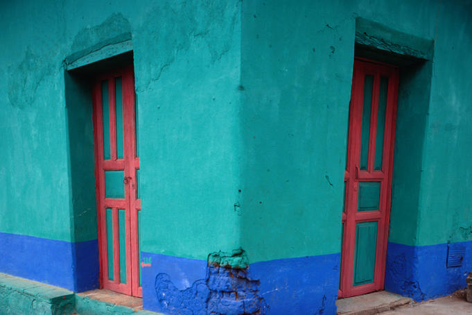 Brightly painted corner house in Chinique.