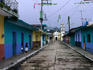Painted row of houses with distant chapel in Acatlan, Veracruz.