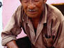Portrait of Maya labourer at his family tomb on Day of Dead in Pomuch.