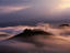 Morning mist over hills near Siena.