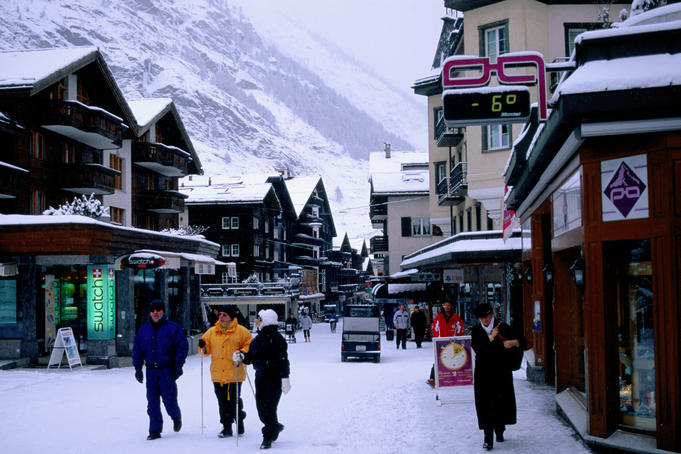 Main street in montain village of Zermatt, Swiss Alps.