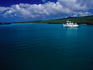 Cruise boat anchored in bay between Lobos and San Cristobel Islands.