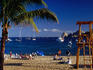 Lifesaving stand and people on Playa Medano, Bahia San Lucas.