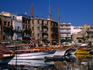 Boats and buildings of Girne Port.