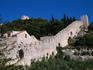 Defensive walls going up to Venetian citadel built in 1850's.