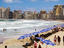 Beachgoers and umbrellas, Egypt