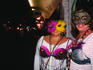 Costumed revellers at Fat Tuesday, Mardi Gras on 6th street.