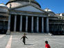 Children playing soccer on Piazza del Plebiscito in front of Chiesa di San Francesco di Paolo.