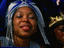 Portrait of woman with headress.