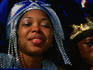 Portrait of woman with headress.