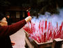 Worshipper lighting incense, Wild Goose Pagoda.