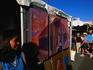 Artist at her booth in Santa Fe Plaza.