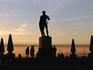 Silhouetted statue and trees at Royal Palace.