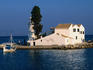 The 17th century Vlaherna Monastery on the small island of Kanoni on Corfu. Kanoni (meaning cannon) is linked to the mainland by a cement dock also built in the 17th century.