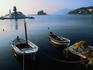 Looking over to the 17th century Vlaherna Monastery on the small island of Kanoni, off the coast of Corfu. The island is linked to the mainland by a cement dock, also built in the 17th century.