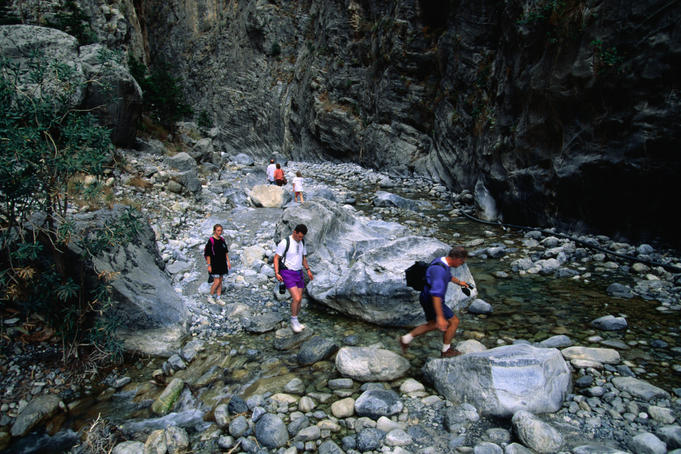Hikers in a narrow part of Samaria Gorge.