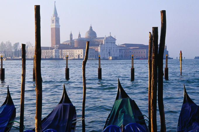 San Marco across canal with gondolas in foreground.