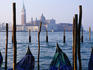 San Marco across canal with gondolas in foreground.