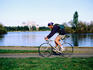 Cyclist beside Lake Burley Griffin.