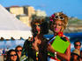 Presenters at gay drag races at Bondi Beach, part of Mardi Gras.