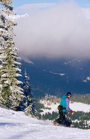 Skier on slope at Snoqualmie ski area near Seattle.