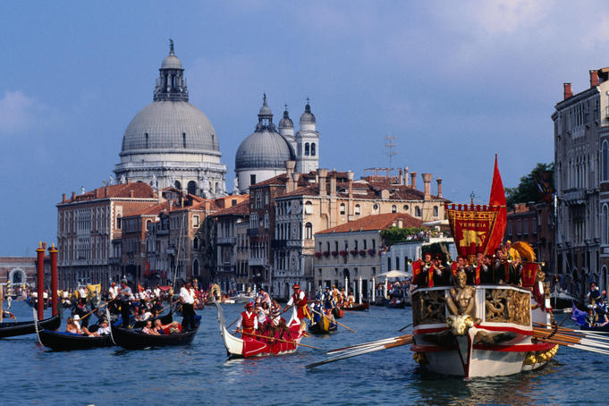 Bucintoro Galleon leading the Historical Regatta pageant in Grand Canal.