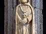 South West France, Dordogne. Statue af St Dominique, on the facade of the church in the 13th century medieval bastide.