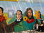 Mural on wall depicting religous and patriotic figures.
