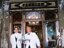 Waiter and doorman at door of Caffe Florian on Saint Marks Square (Piazza San Marco).