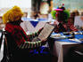 Clowns reading menu at clown convention.